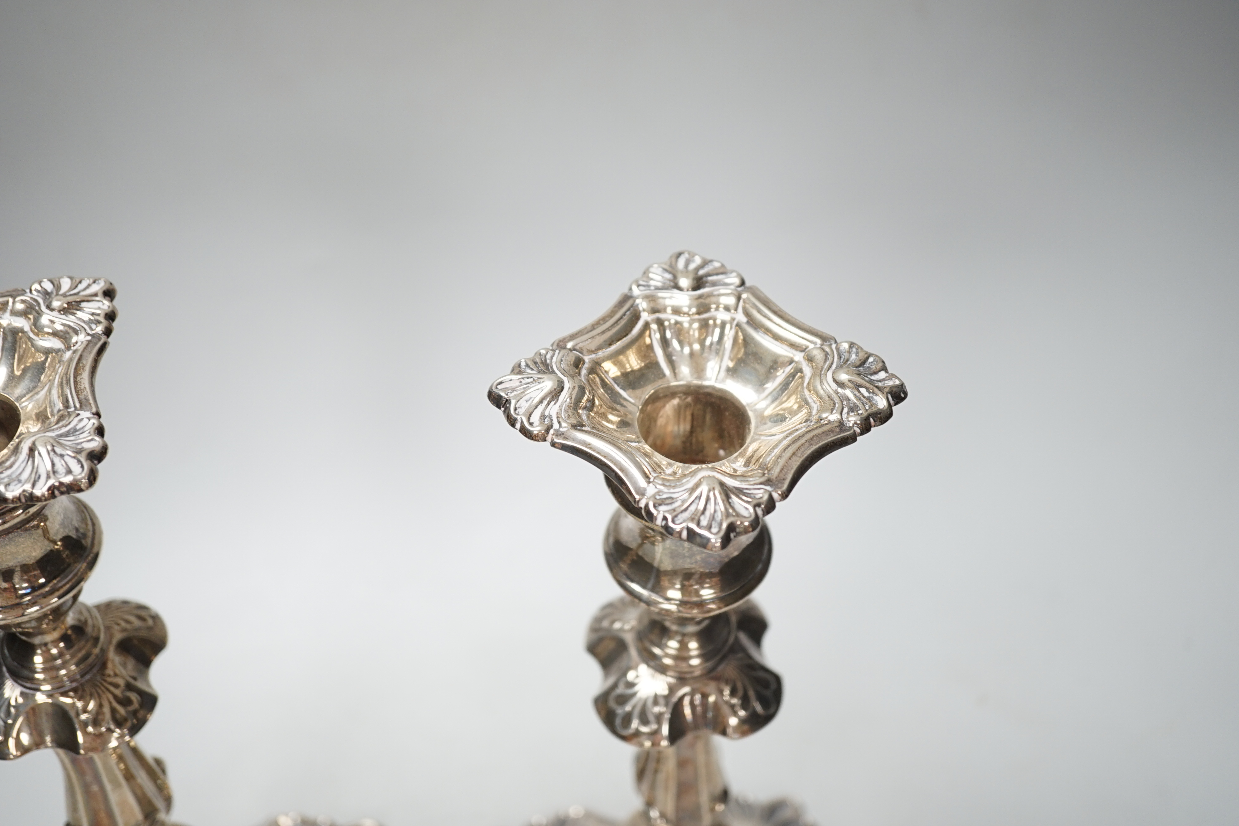 A pair of Edwardian silver candlesticks, with waisted, knopped stems, William Hutton & Sons Ltd, London, 1907, 30cm, weighted.